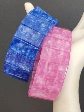 Pair of pink and blue panel stretch bracelets